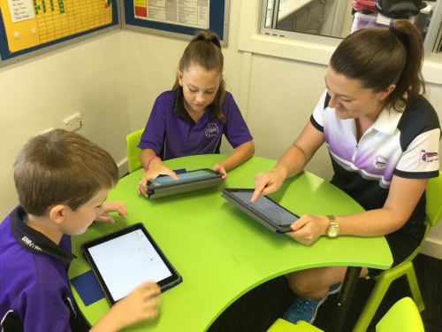 children with iPads